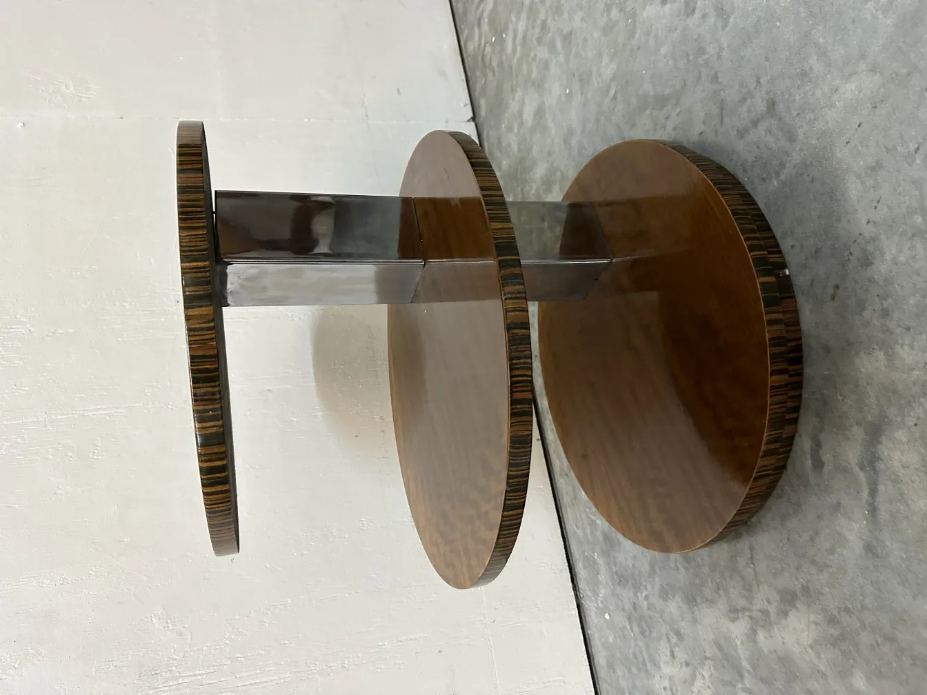 Antique small table with two levels, sleek and stylish design.