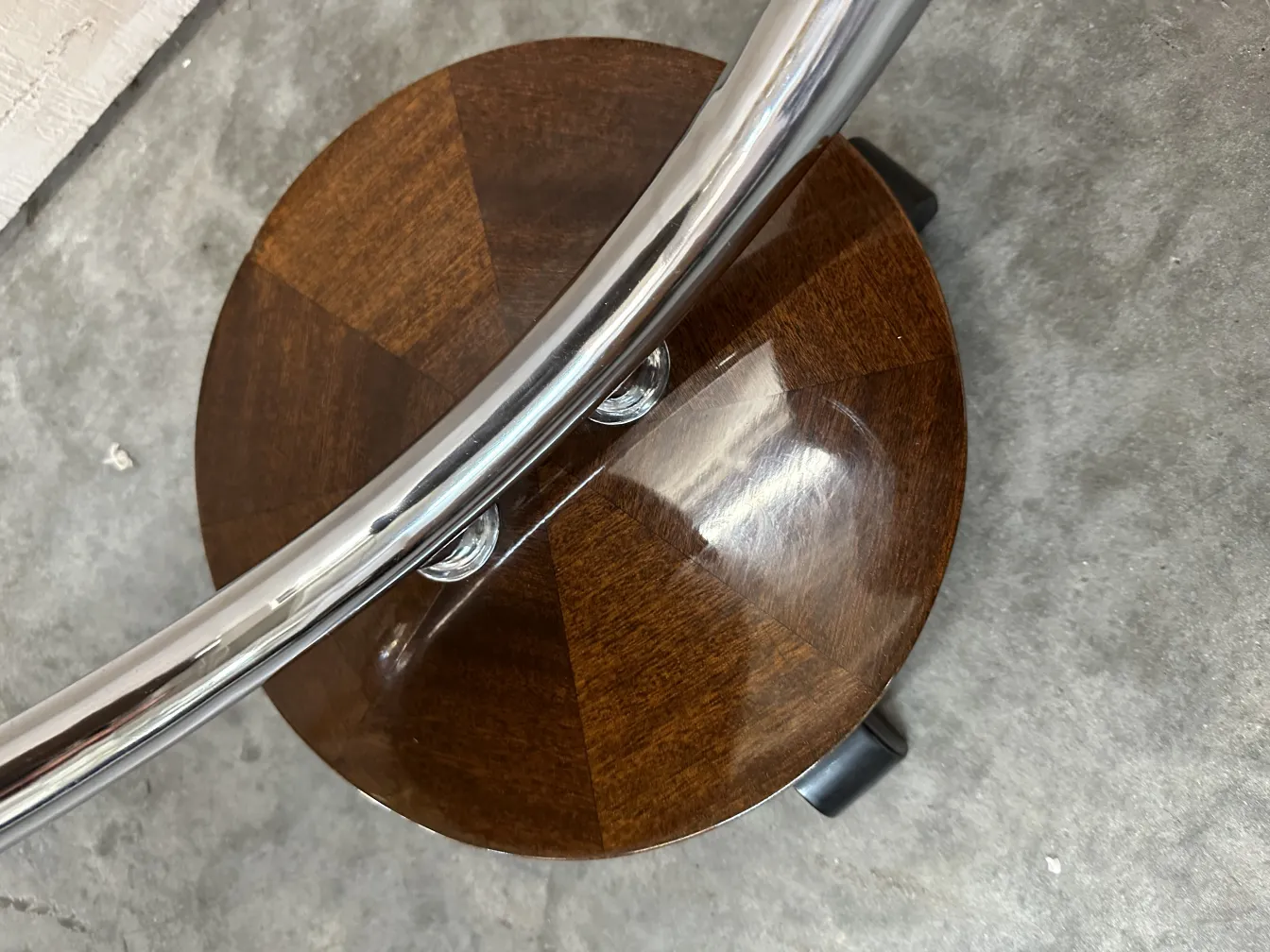 antique small table with a round shape and subtle details