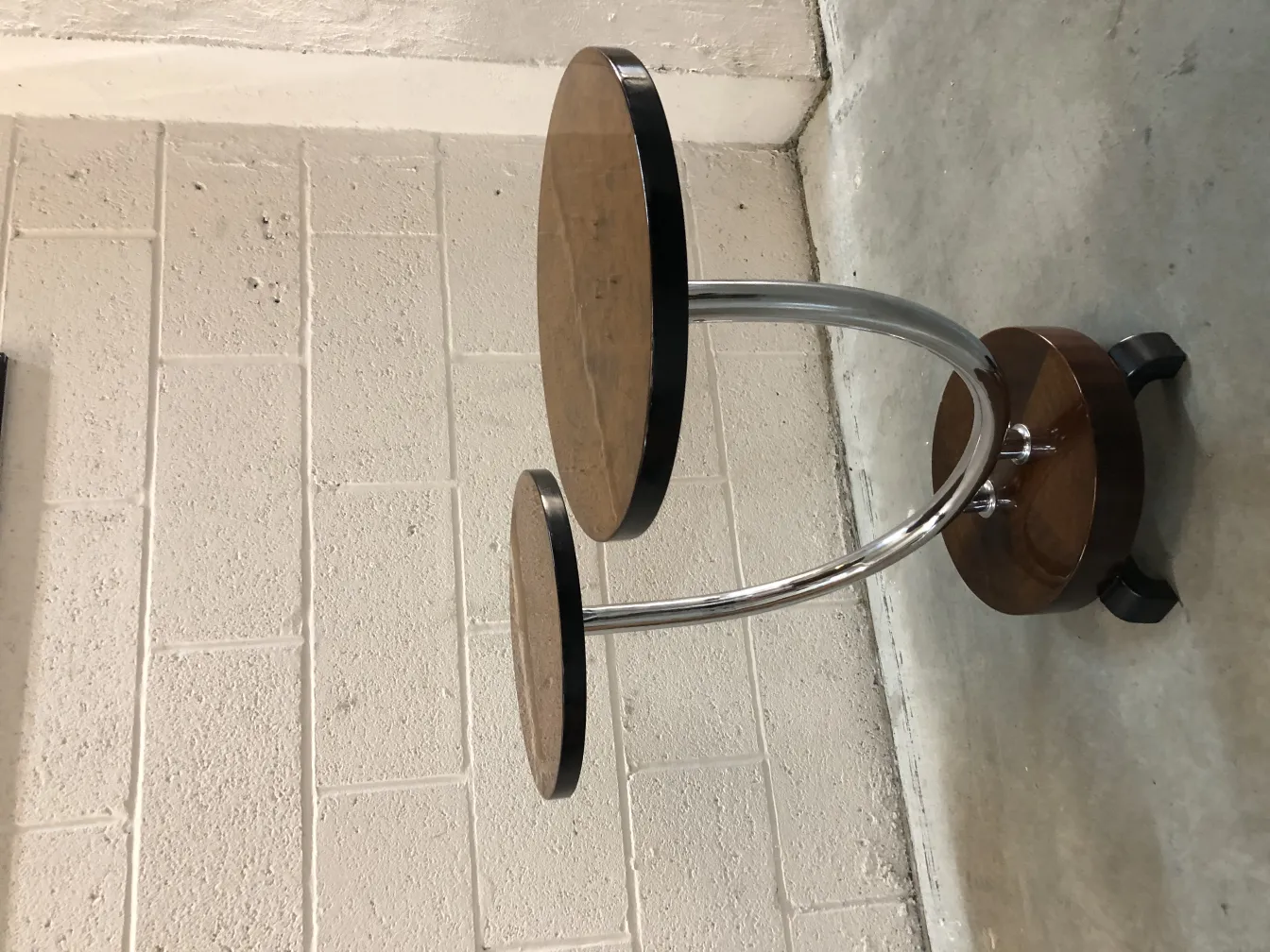 antique two-tier small table with metal legs