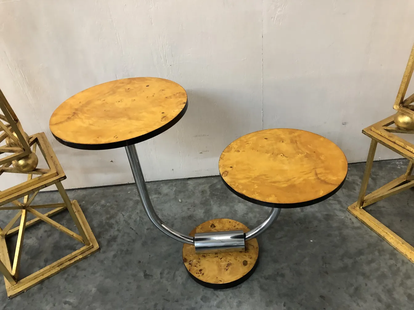 antique small table with two levels in cozy setting