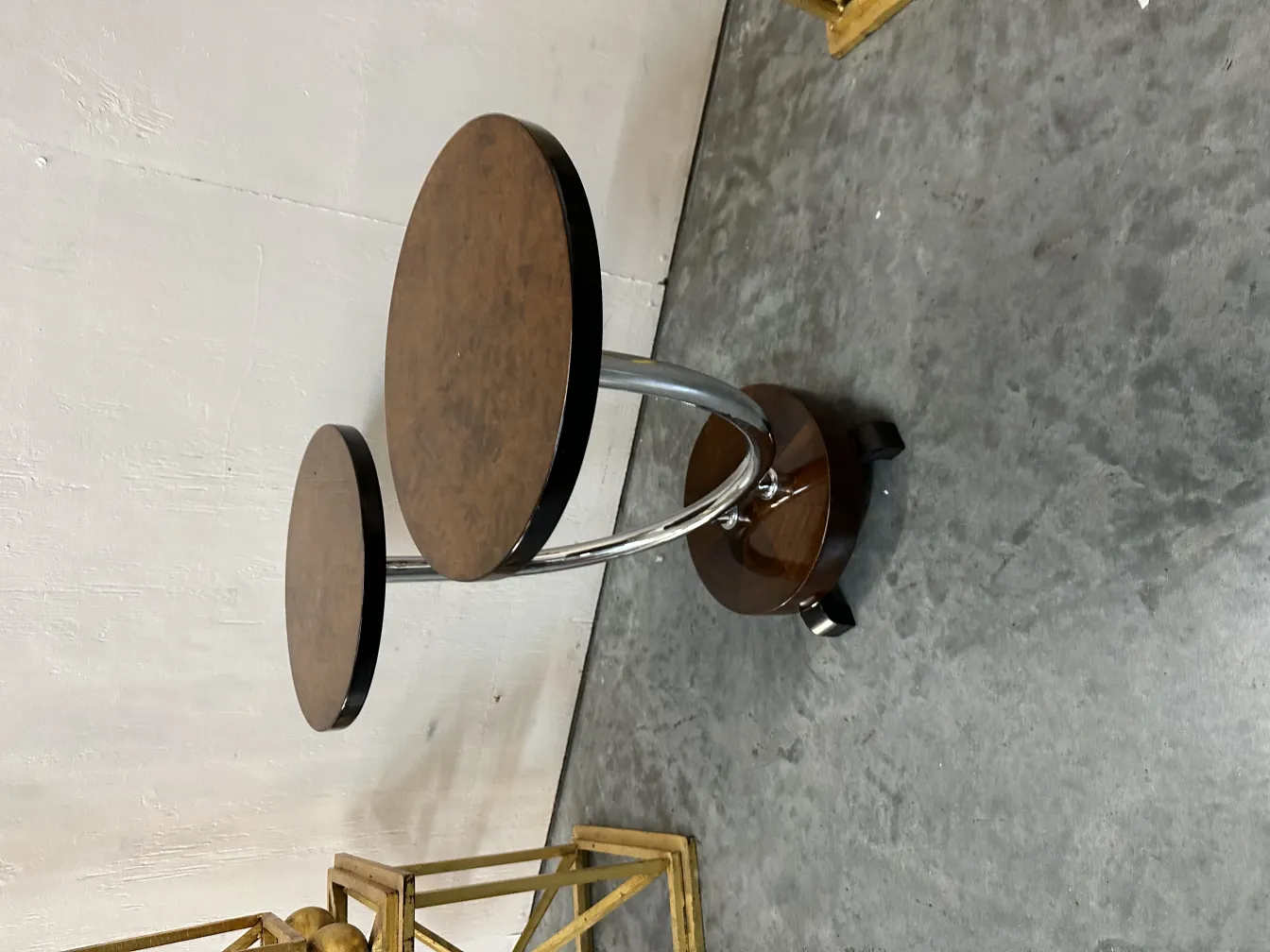 Antique round small table with elegant design in environment