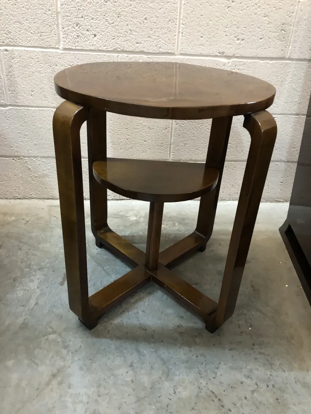 antique small table with a round shape and light background in a simple setting