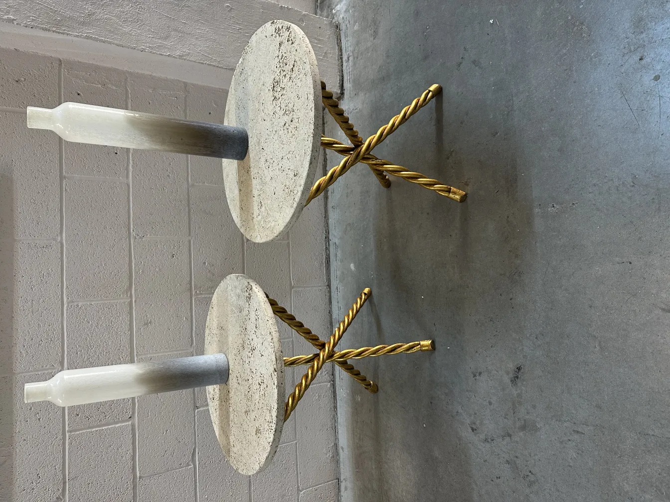 2 antique small tables with golden bases and round tops