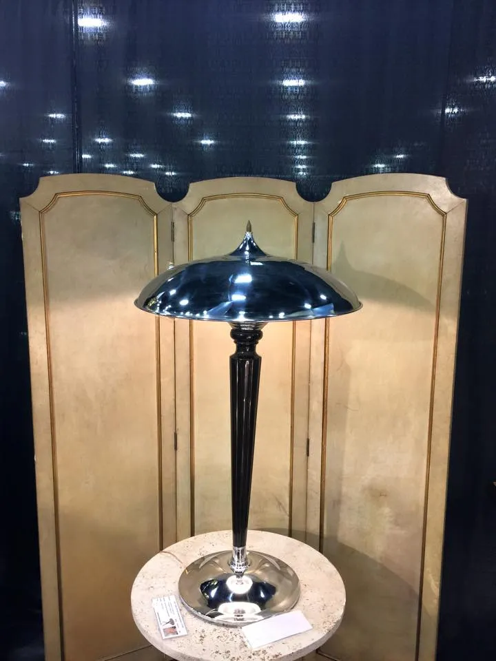 Image of two antique small tables in an elegant setting