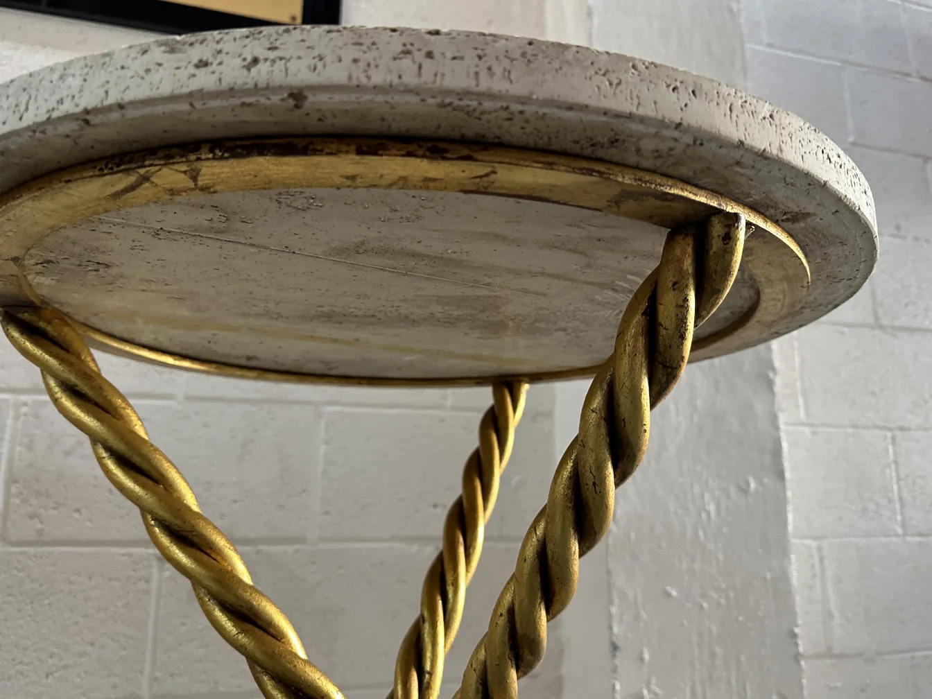 two antique small tables with golden base, neutral background