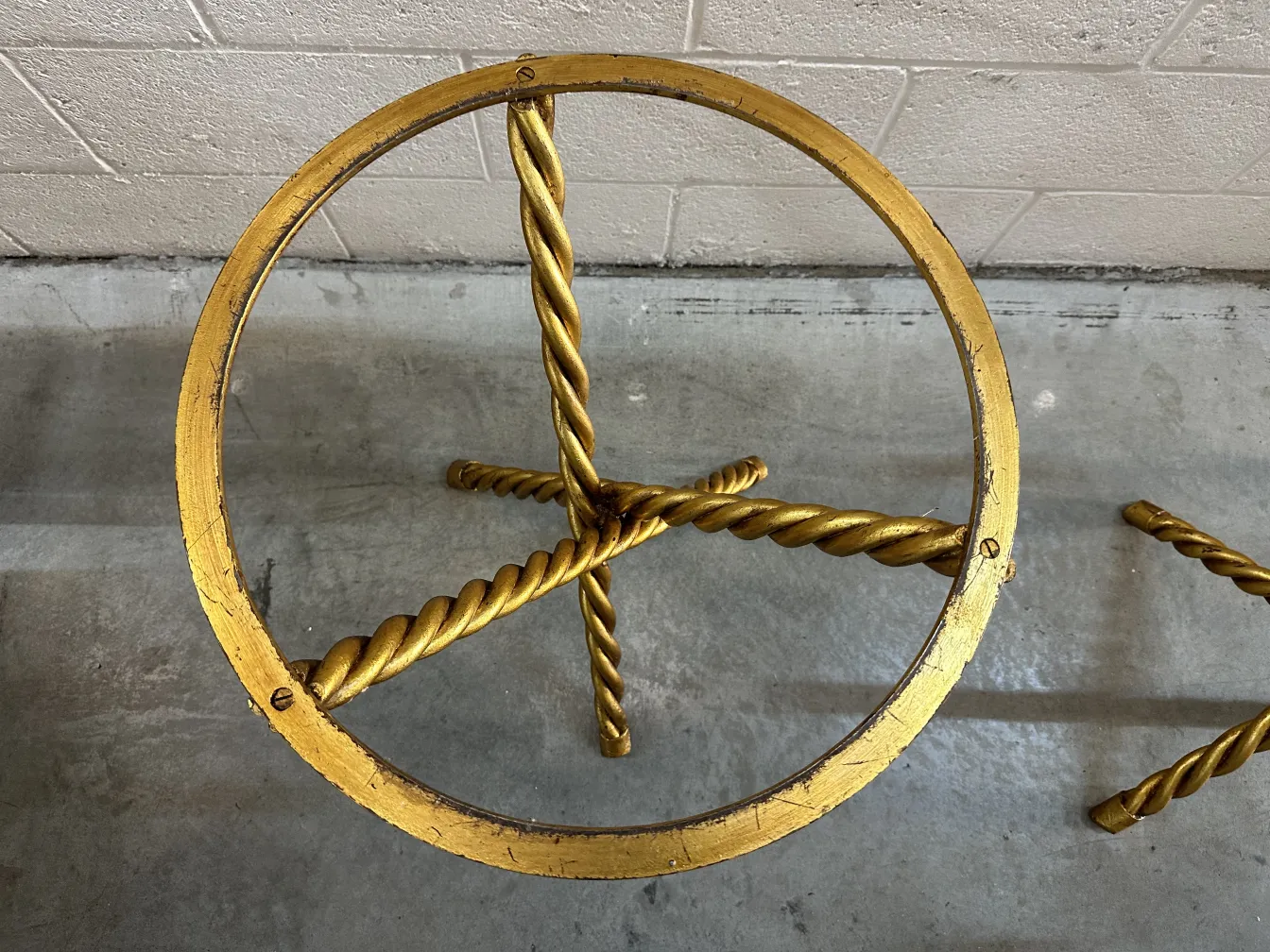 Top view of 2 antique small tables with decorative golden base