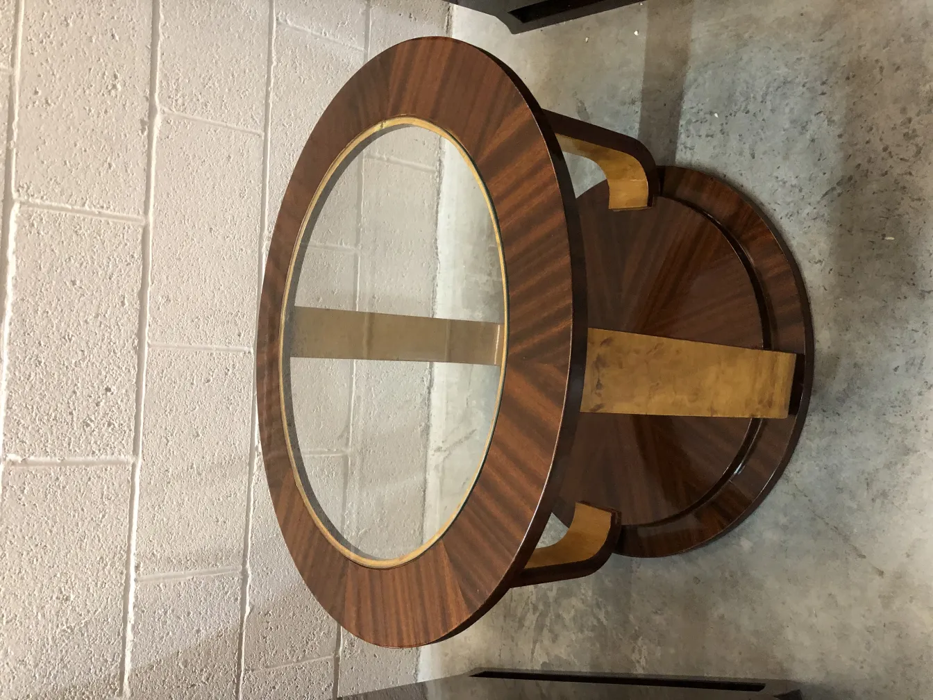 two antique small tables with round design and gold detail