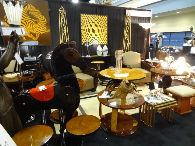 Two antique small tables with decorative designs in a setting