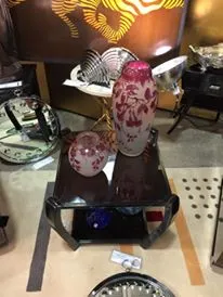 Two antique small tables with floral decoration and a large vase