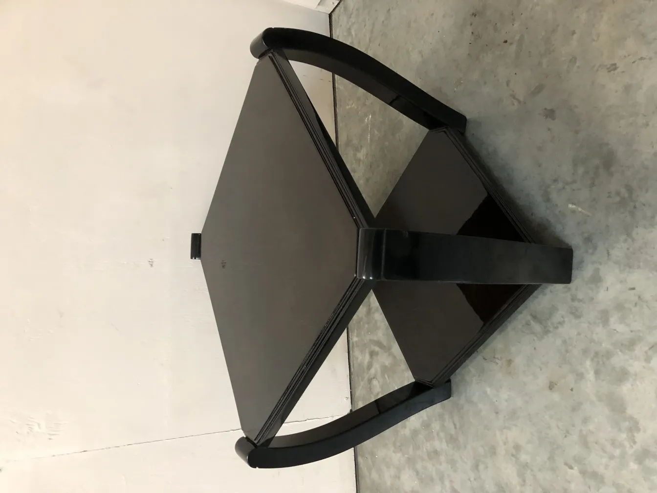 two antique small tables in dark color with elegant details