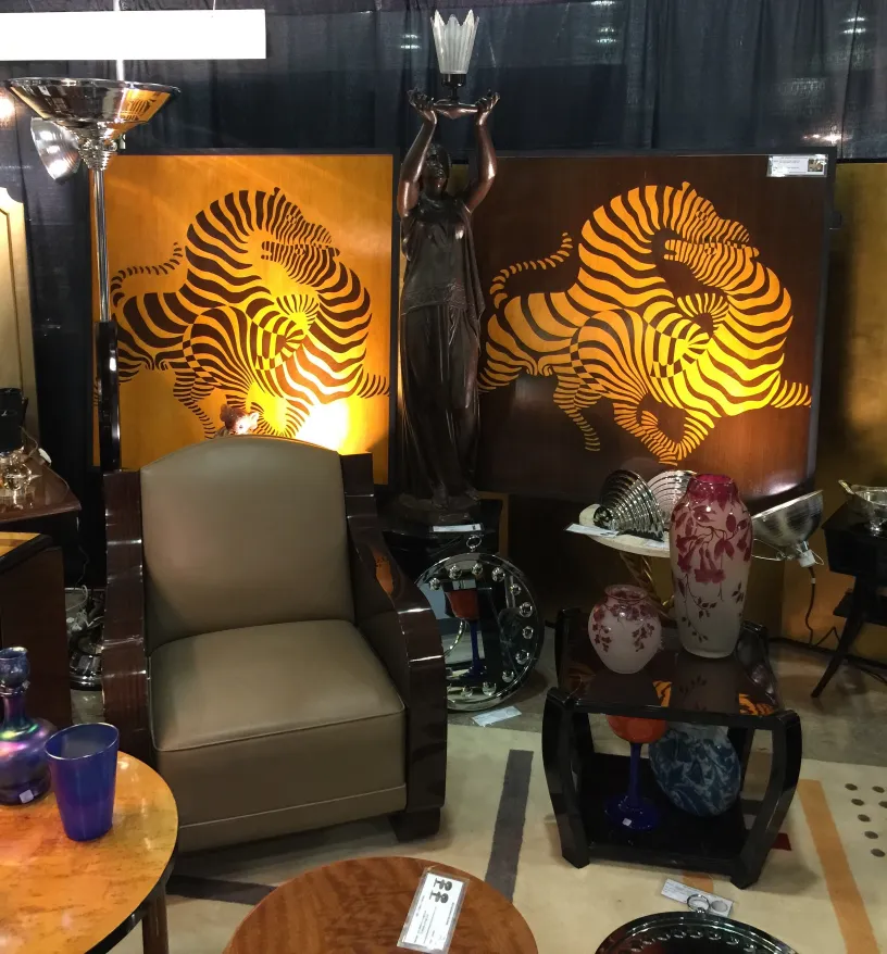 Two antique small tables with attractive design in a decorative setting.