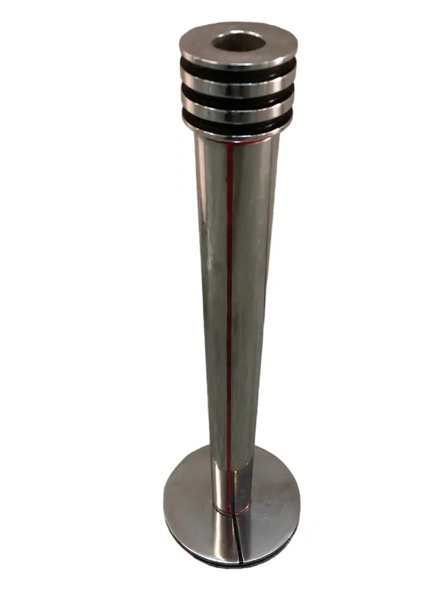 close view of two elegant antique candle holders in a conical shape