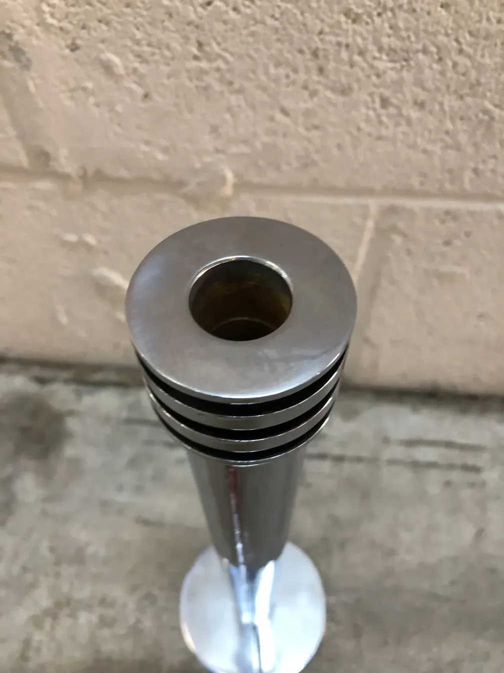 2 antique cylindrical candle holders with details