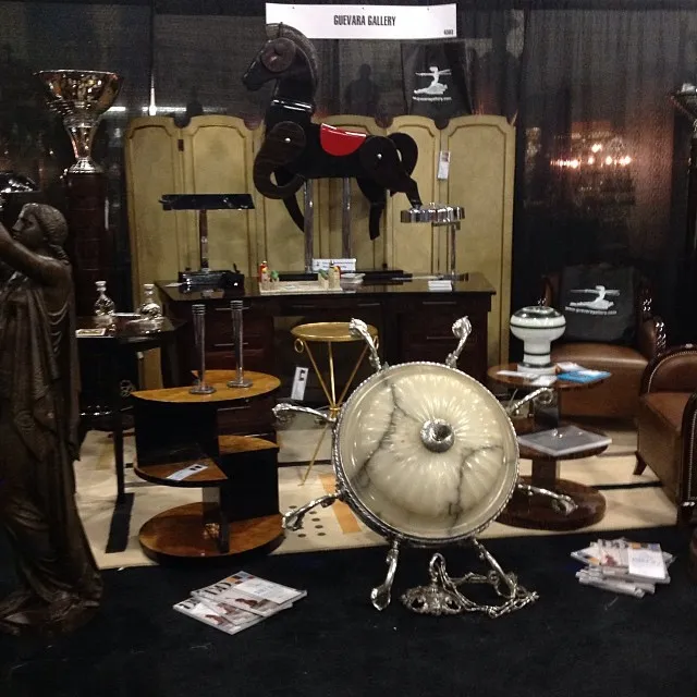 Pair of antique candelabras with classic design on display