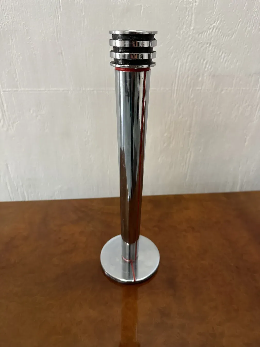 2 antique candlesticks maison desny on a table