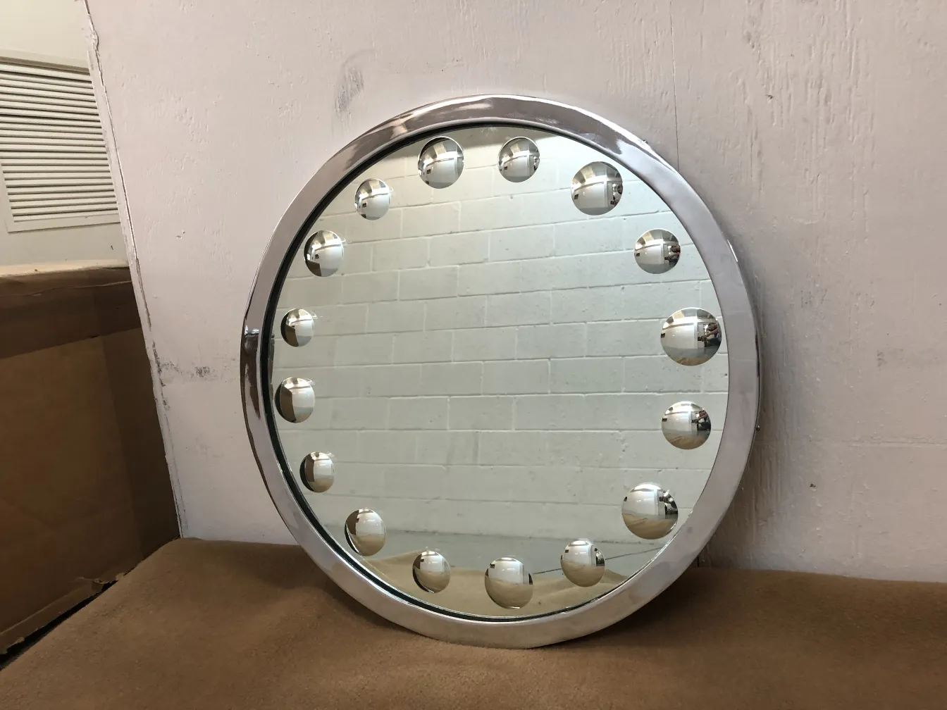 antique mirror with round decorative lights around
