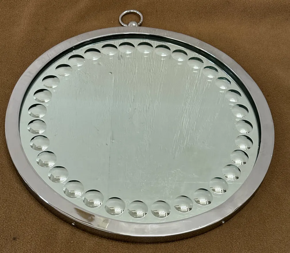 Two antique round mirrors with decorative edges