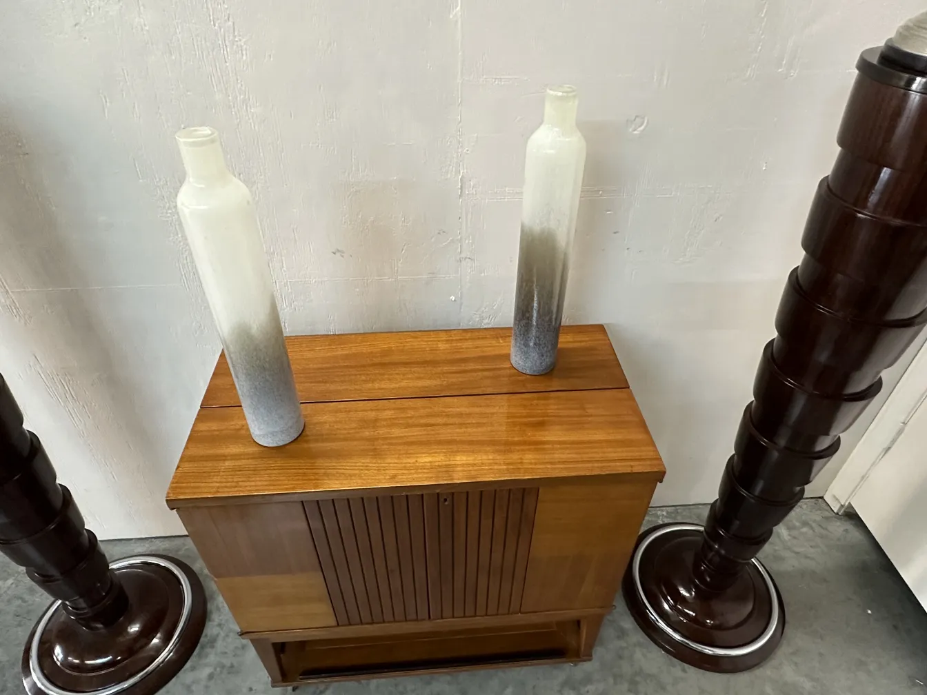 View of an antique bar with decorative bottles in the background