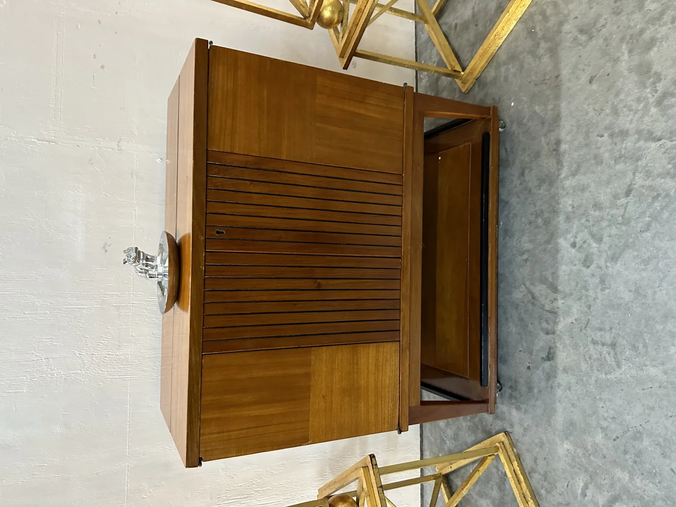 Antique bar with multiple compartments and classic design.