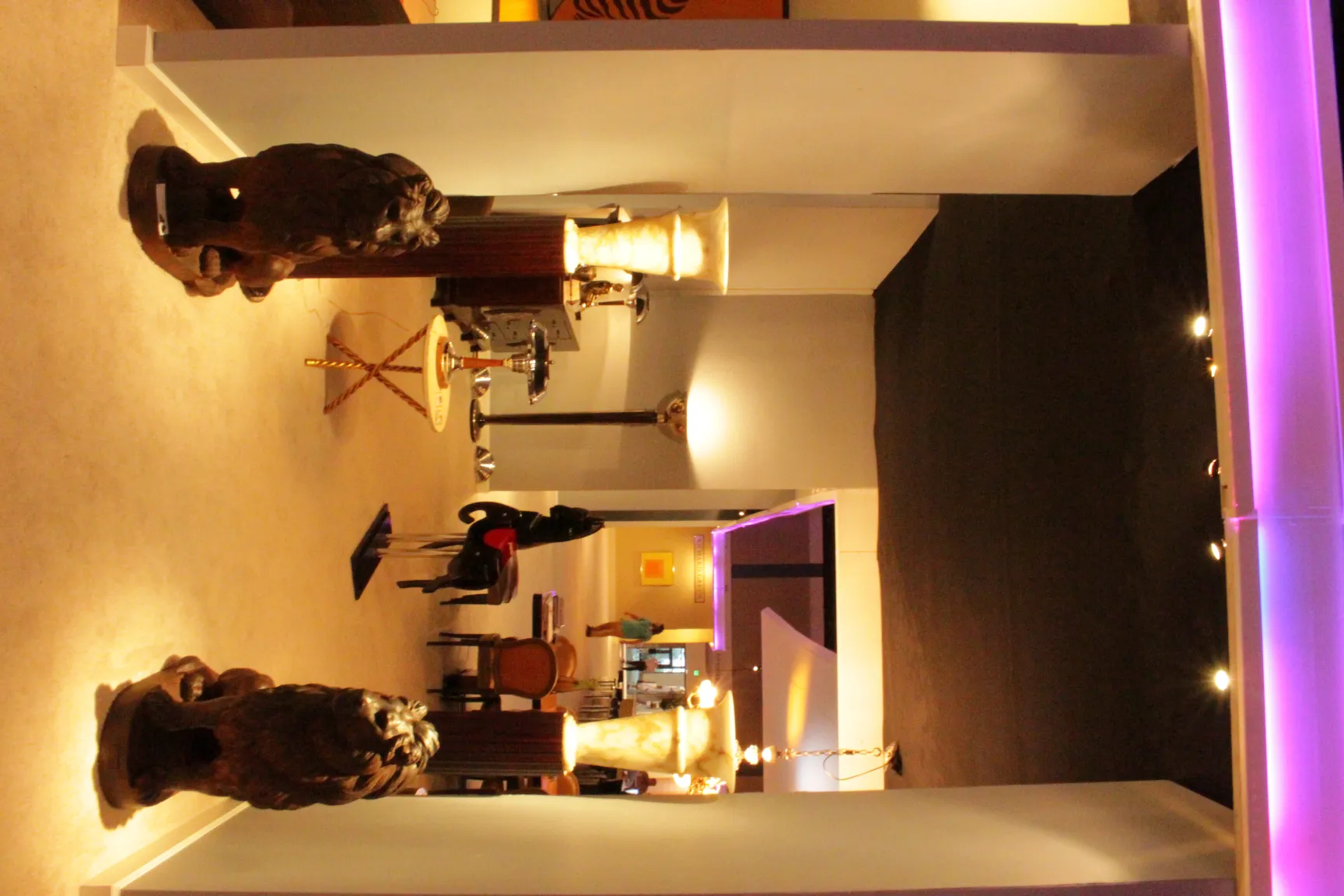 antique sculpture of a horse in a modern setting