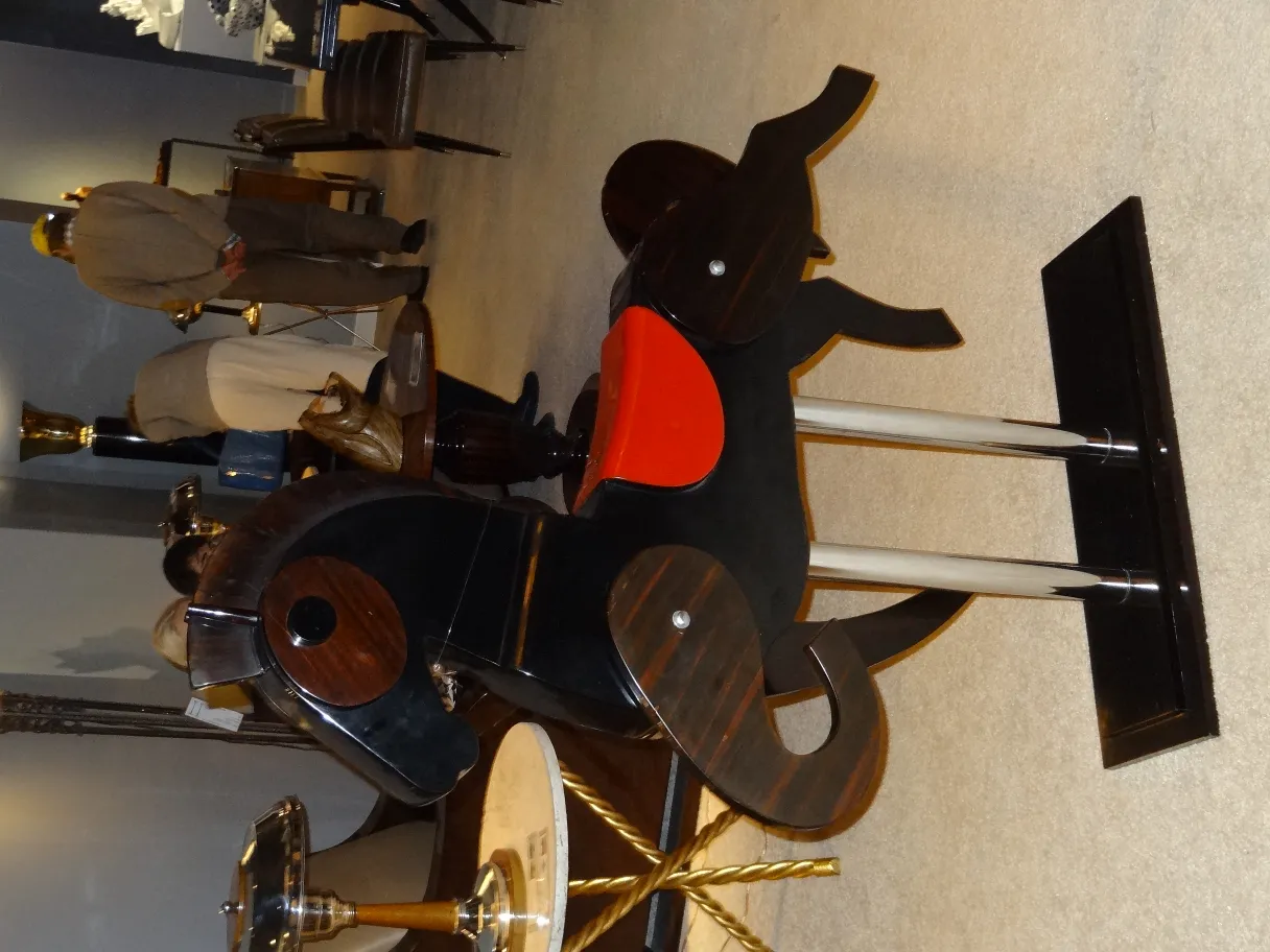 antique horse with a detailed and colorful design in an elegant setting