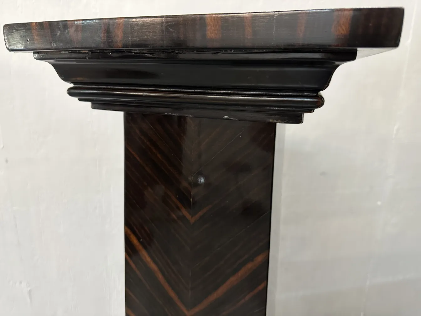 antique column with sophisticated and elegant design, simple background