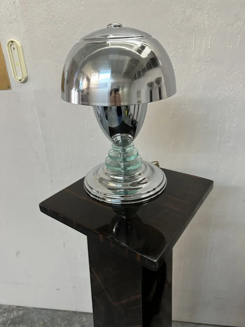 detail of antique column with shiny sphere on top