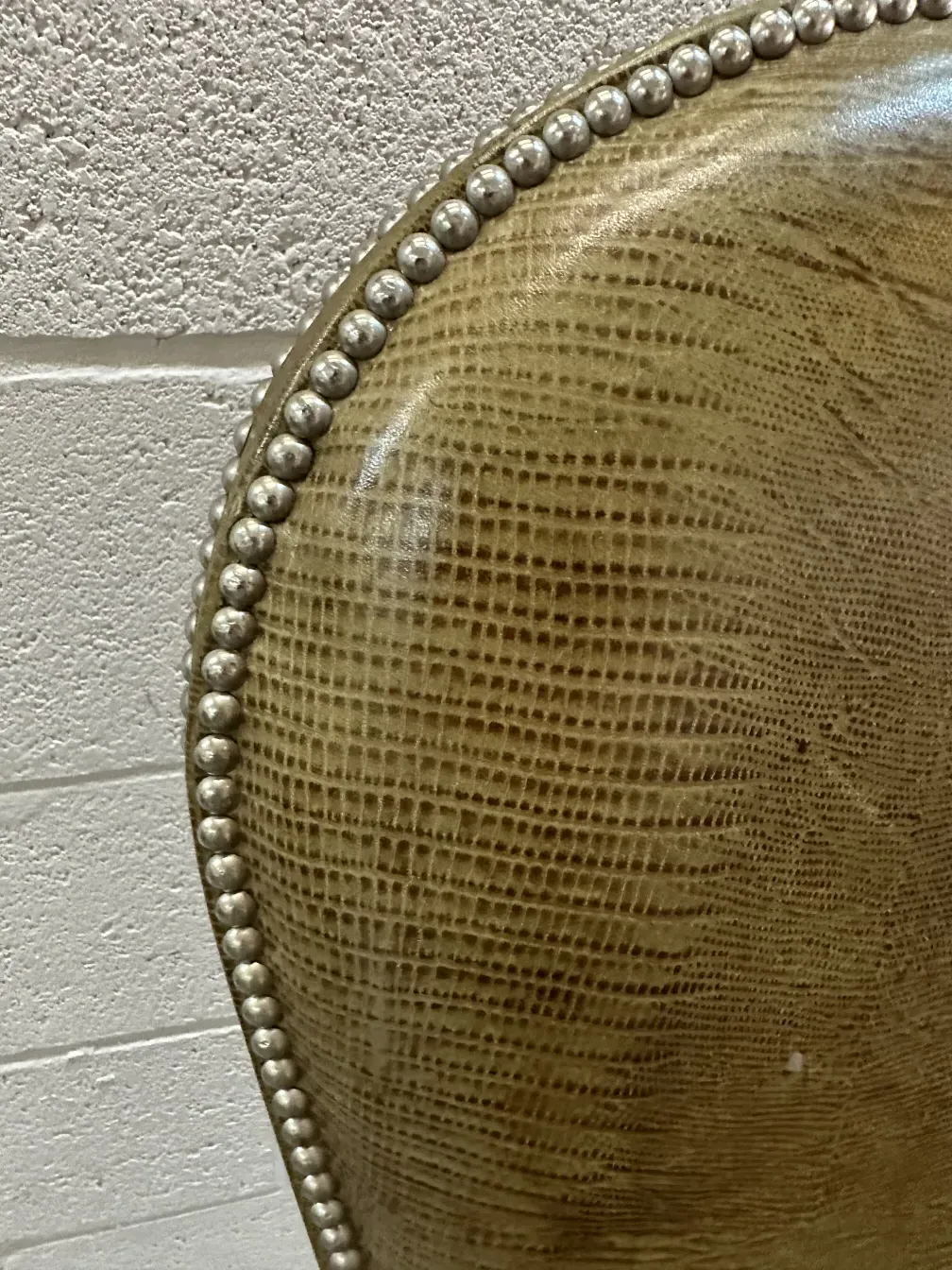 antique chairs with upholstery and metallic details