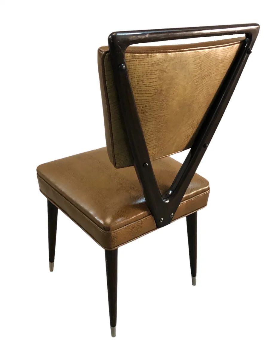 Side view of 12 antique chairs carlo mollino with triangular backrest.