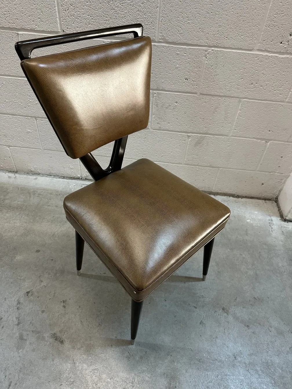 12 antique chairs carlo mollino in a neutral setting