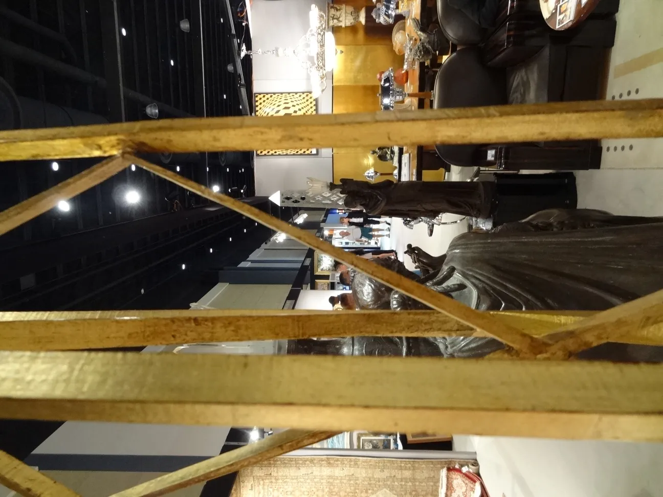 Antique sculpture of 2 obelisks in an antiques setting.