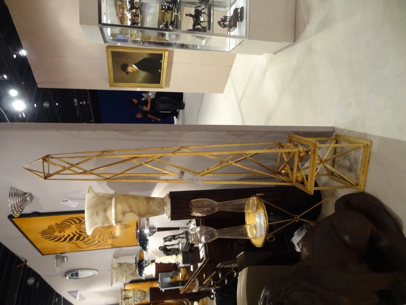 two ancient obelisks with decorative details in an elegant setting