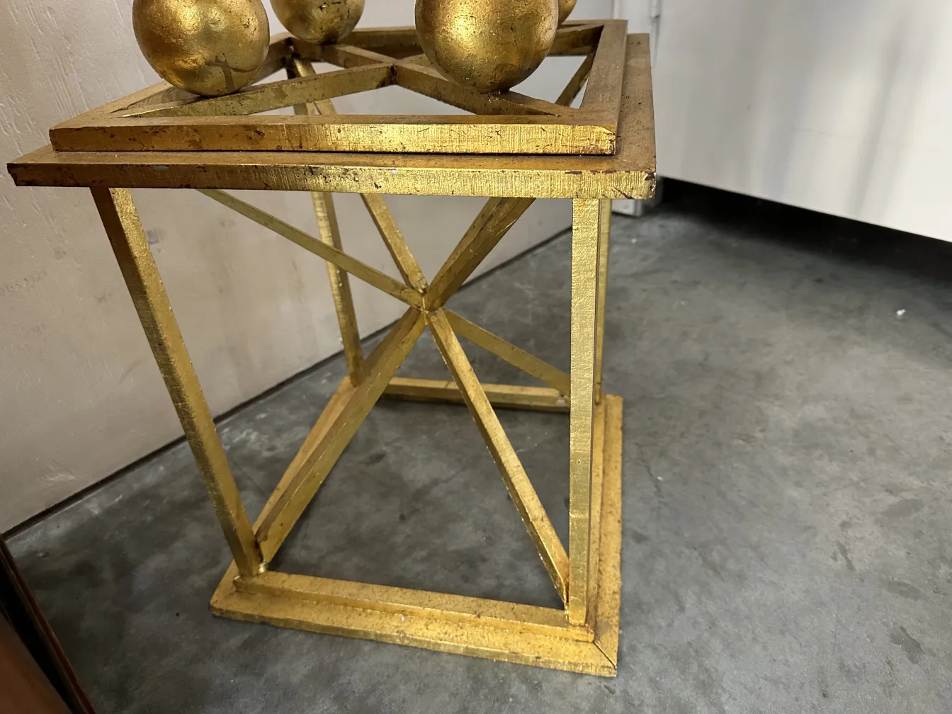 two antique decorative obelisks in an elegant setting