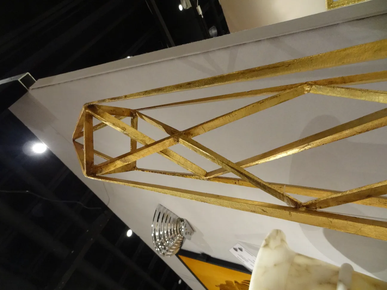 two antique decorative obelisks in an elegant setting