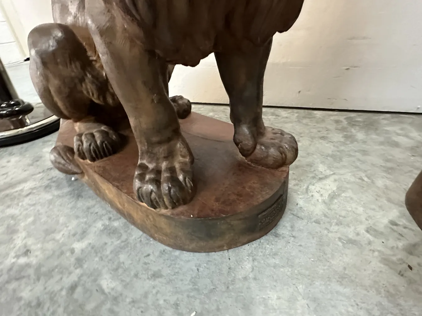 ancient sculpture of two lions by a. durenner on a base