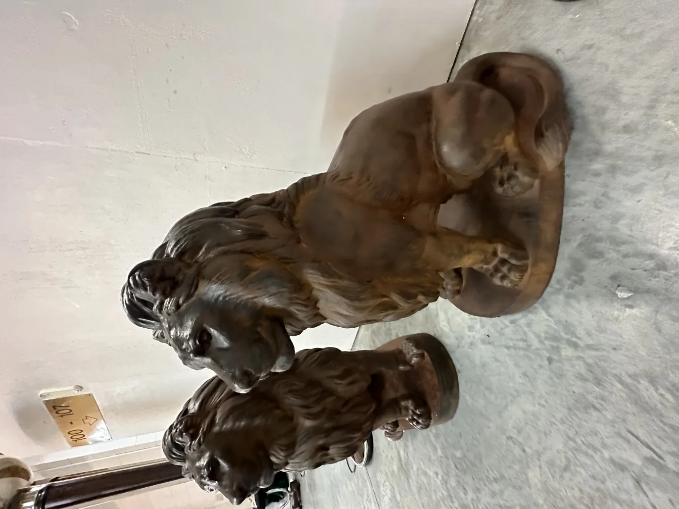 antique sculptures of two lions with fine details