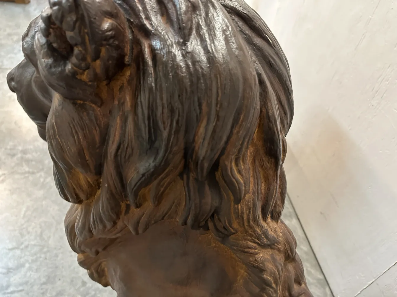 antique sculpture of two lions with realistic details