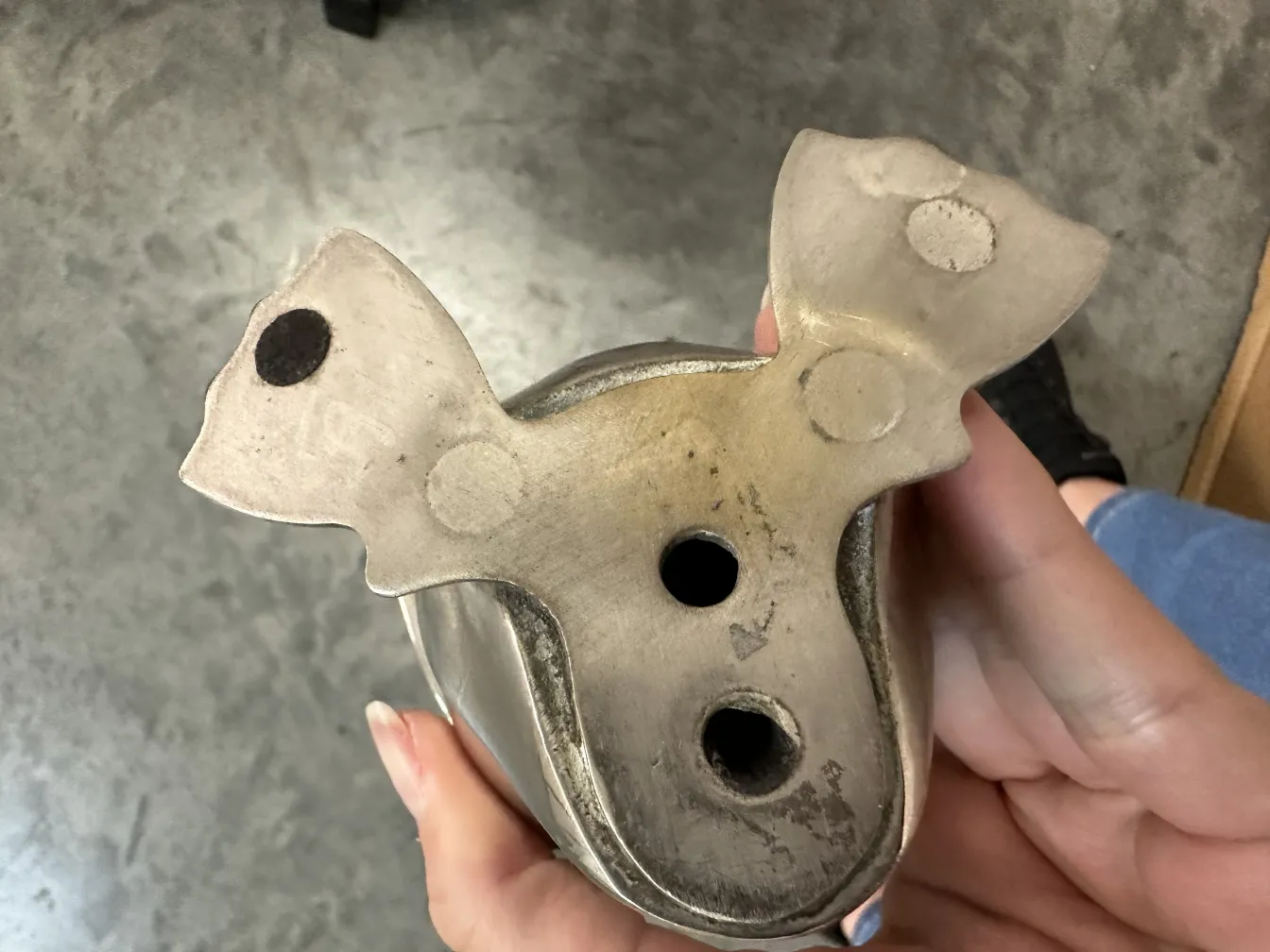 antique sculpture of 2 penguins with visible details