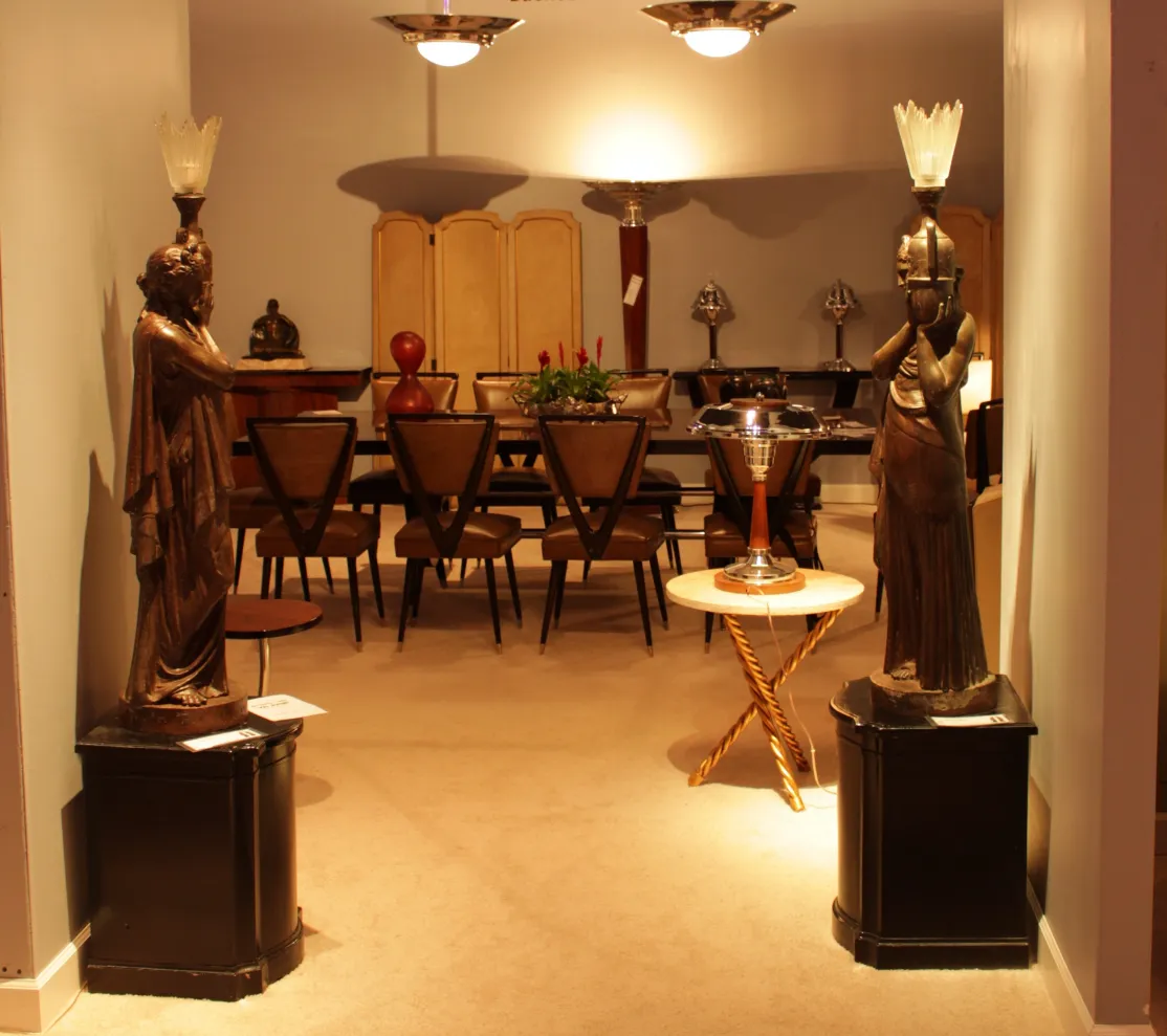 Antique dining table for 10 people in an elegant setting