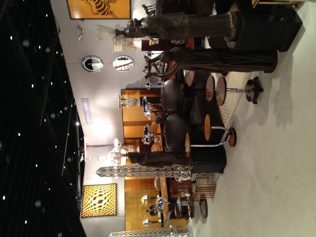 antique val d´osne sculpture in a stylish gallery setting