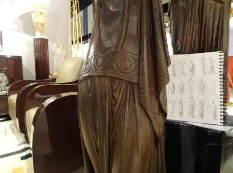 antique val d´osne sculpture in a decorative setting