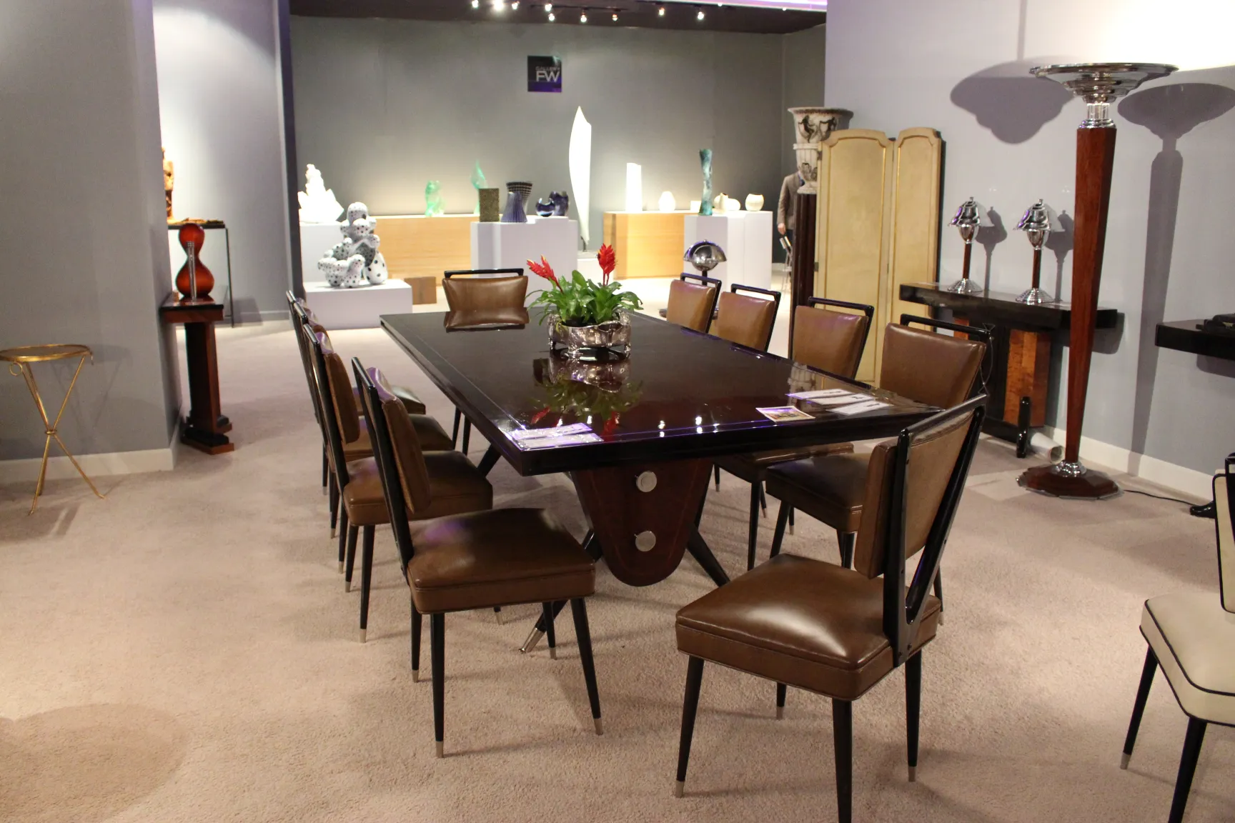 exhibit of antique folding screens by adolphe chanaux, showcasing a range of furniture