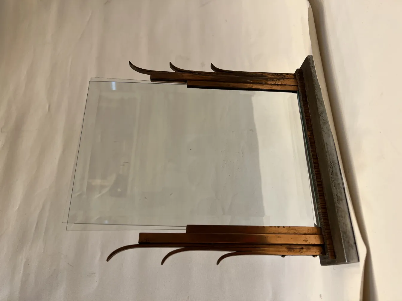 Antique picture frame with clear glass, classic design.