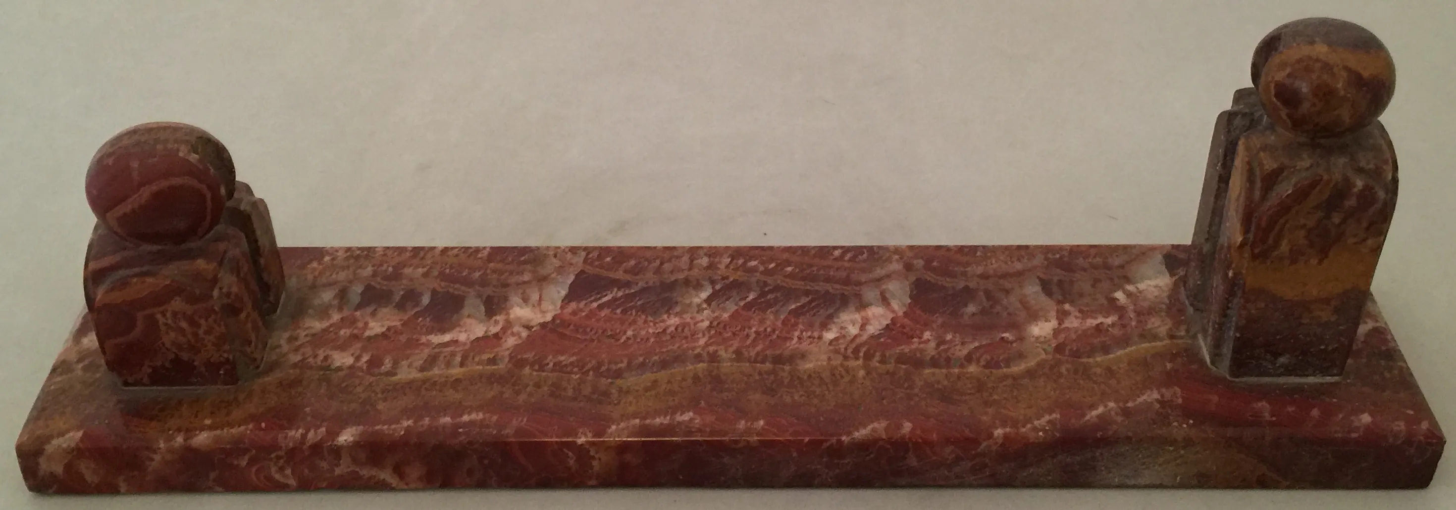 Antique picture frame with decorative figures