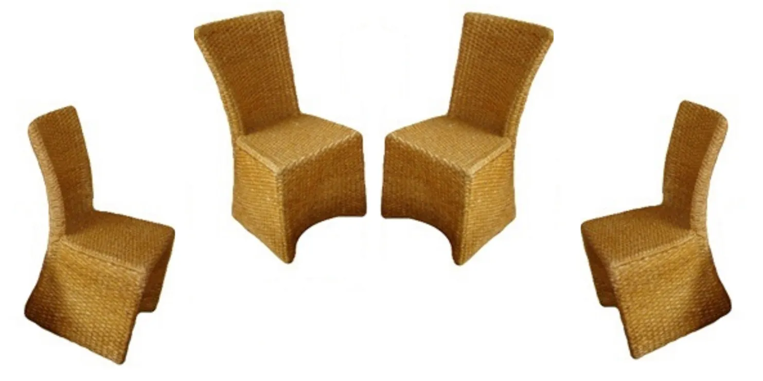 antique dining table for 4 people, with chairs in a cozy setting