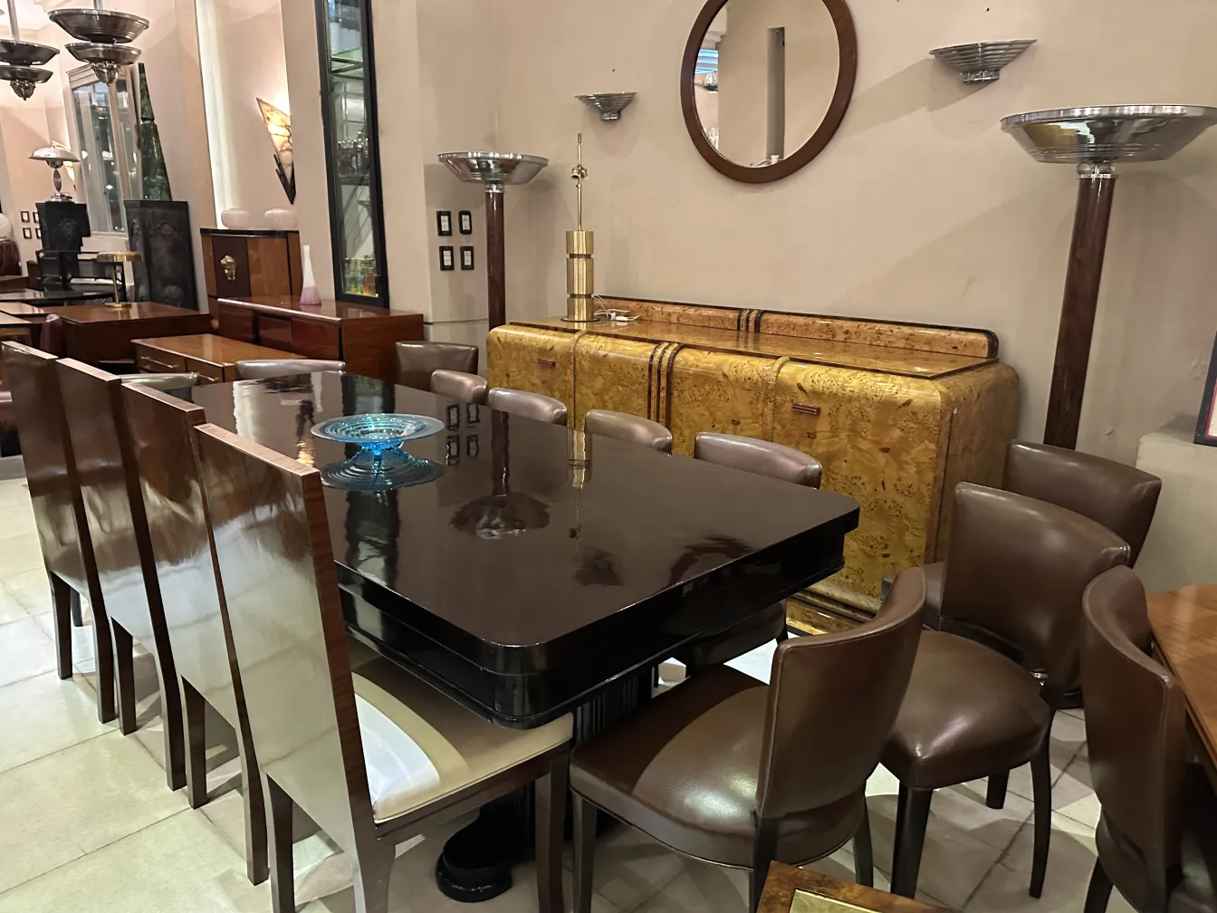 antique dining table with chairs in elegant setting