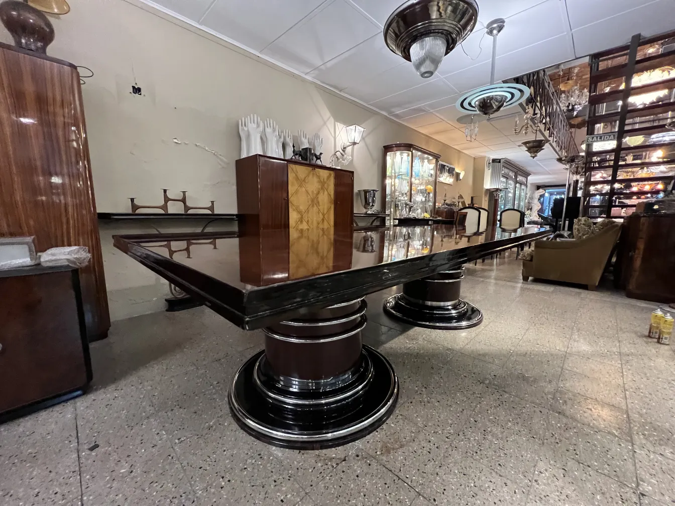 antique dining table for 14 people, featuring elegant design and sturdy legs in a refined setting