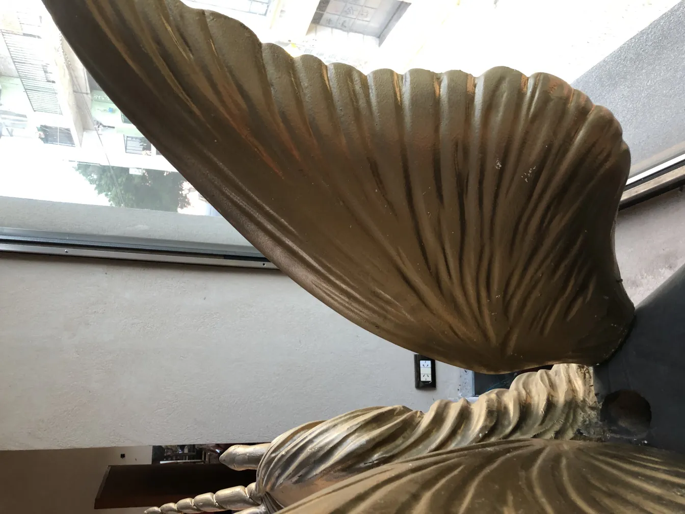 Side view of an antique unicorn featuring fine ornate details