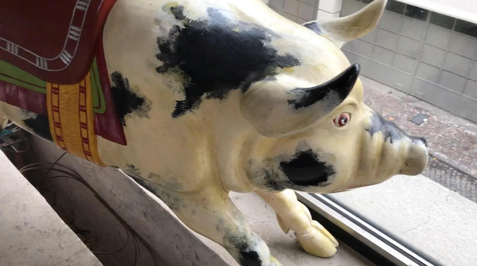 antique decorative pig with worn paint