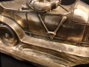 Antique WMF inkwell with intricate design and details.